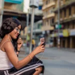 A U.S. woman talking on a video call by using her smartphone