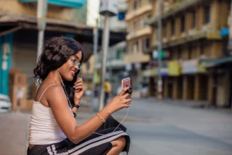 A U.S. woman talking on a video call by using her smartphone